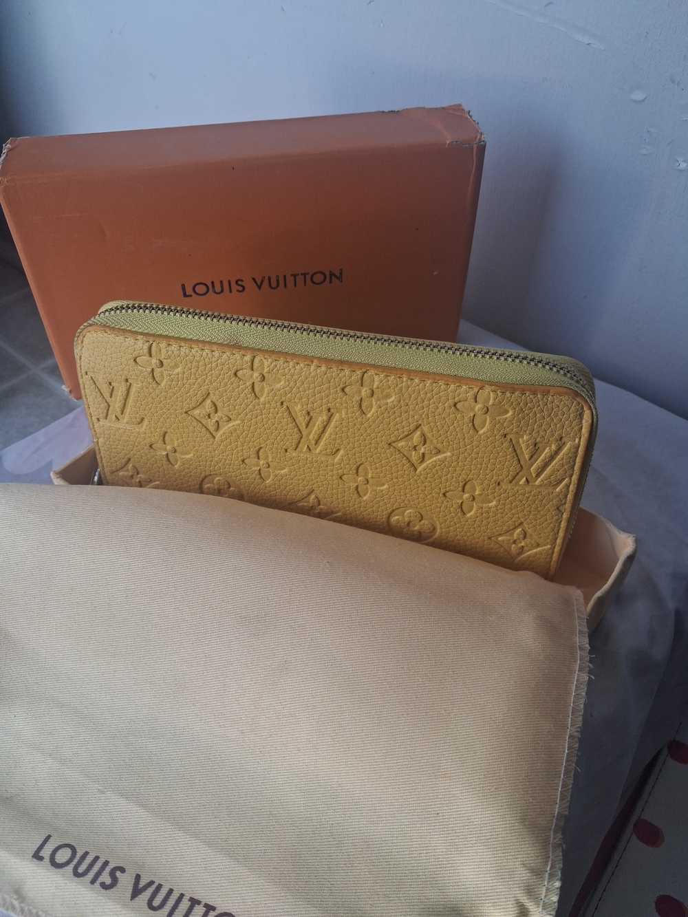 Louis Vuitton Long Zippy Wallet in Yellow